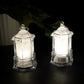 LED hanging lantern style flameless candle glowing softly in ambient lighting