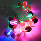 Multicolor flower LED string lights detail showing flower-shaped covers