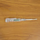 Digital voltage tester pen in use detecting a live wire with LED indication