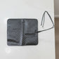 Inside view of foldable makeup brush organizer pouch displaying multiple slots