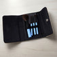 4-in-1 makeup brushes arranged inside the included travel pouch
