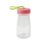 Glass container with brightly colored silicone cap and ergonomic handle