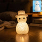 Snowman LED night lamp with crystal-style textured design on table