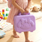 Open kids bear hard shell carry case displaying neatly organized interior compartments