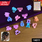 Close-up of assorted vibrant mini hair claw clips in various colours.