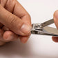 Compact stainless steel nail clipper suitable for travel and home use