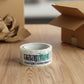 Heavy-duty printed packaging tape roll with a white core, ready for use.