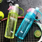 Blue 600ML Spray Water Bottle, ideal for staying hydrated during outdoor activities.