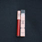 Red Rush Liquid Lipstick tube and applicator wand side view