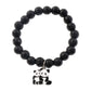 Black beaded stretch bracelet with panda charm shown on a person’s wrist.