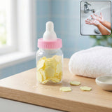Portable baby bottle soap paper sheets set in a compact container for hand hygiene