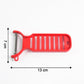 Close-up view of stainless steel grater and peeler for ginger