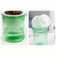 Top view of plastic self-watering bamboo style flower pot