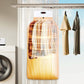 Portable electric clothes dryer drying garments in hot air circulation