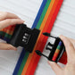 Rainbow Luggage Strap neatly folded for compact storage when not in use.