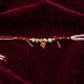 Traditional Ganesh rakhi with gold wire work