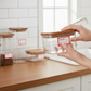 Address label sheets showcasing red and white self-adhesive stickers