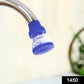 Angled view of the plastic 360-Degree Shower Head, highlighting its small size and filter holes.