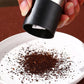 Stylish stainless steel salt and pepper grinder placed on kitchen countertop