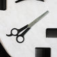 Hair thinning scissors showing detailed micro-toothed blade for bulk reduction