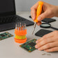 Precision screwdriver tool set showing ergonomic handle and bits