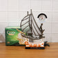 Decorative ship shaped clock lamp placed on office desk for decor