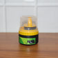 Black shoe polish cream and sponge applicator ready for use