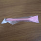 Close-up image of silicone facial mask applicator tool