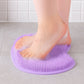 Top view of purple silicone foot scrubber mat with suction cups