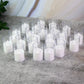 Transparent glass holder on battery-operated LED tealight candle