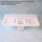Close-up of the two-part plastic soap dish separated, showing the removable drainage tray.