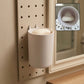 Utility soap box holder showing drainage slots for soap hygiene