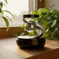 Spinning solar car air freshener orb designed like galaxy