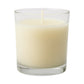 Scented votive candle adding a festive touch to Diwali decorations.