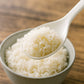Side view of non-stick rice serving spoon for sticky dishes