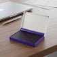 Quick-dry ink pad in use, demonstrating smudge-free impressions.
