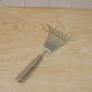 Garden rake being used for garden maintenance and raking