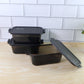 Close-up of a leakproof clip-lock lid on a rectangular food storage container.