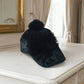 Close-up of plush texture on winter fur cap