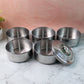Closed stainless steel lunch box showing its sleek, round design.