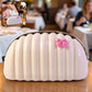 Decorative shell tissue holder without visible bow