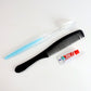 Mini travel hygiene kit featuring toothbrush and comb for quick grooming