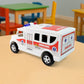 Friction powered ambulance toy displayed on a flat surface for play