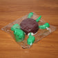 Reusable plastic turtle cup coaster holding a small container