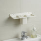 Close-up view of the detachable tumbler and toothbrush slots in the organizer.