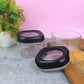 Two transparent plastic storage containers with twist and lock lids by Supermom