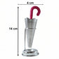 Loose leaf tea brewing inside a glass cup with the elegant stainless steel umbrella tea infuser.
