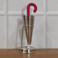 Stainless steel umbrella tea strainer with drip tray stand displayed on a clean white background.