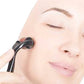 A person demonstrating the gentle application of a derma roller on their skin.