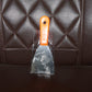 Putty knife with a comfortable soft rubber handle and a hanging hole for easy storage.